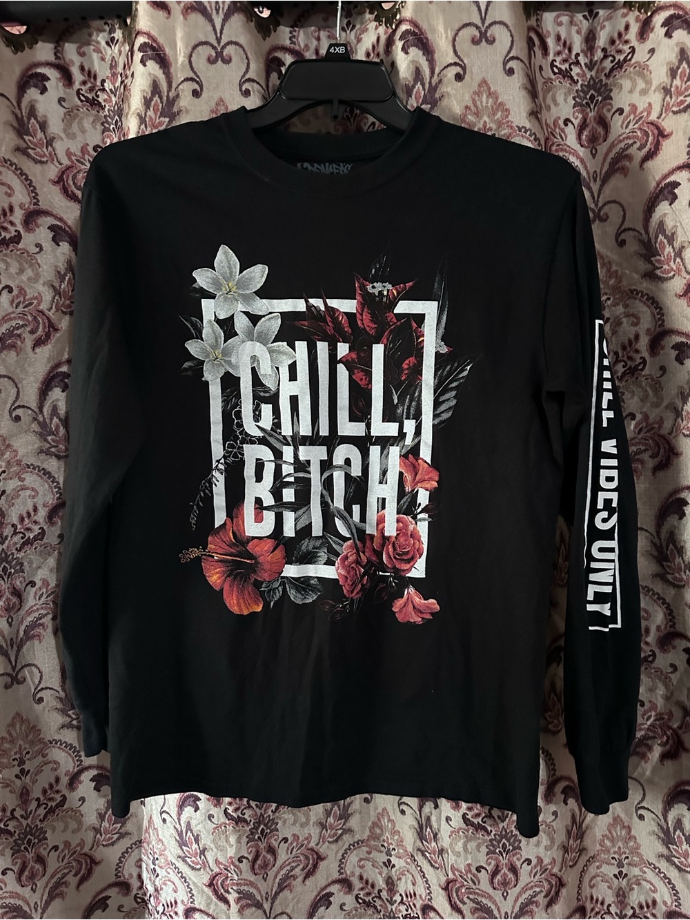 Spencer's Black Long-Sleeve Graphic Tee with Red & White Floral Accents